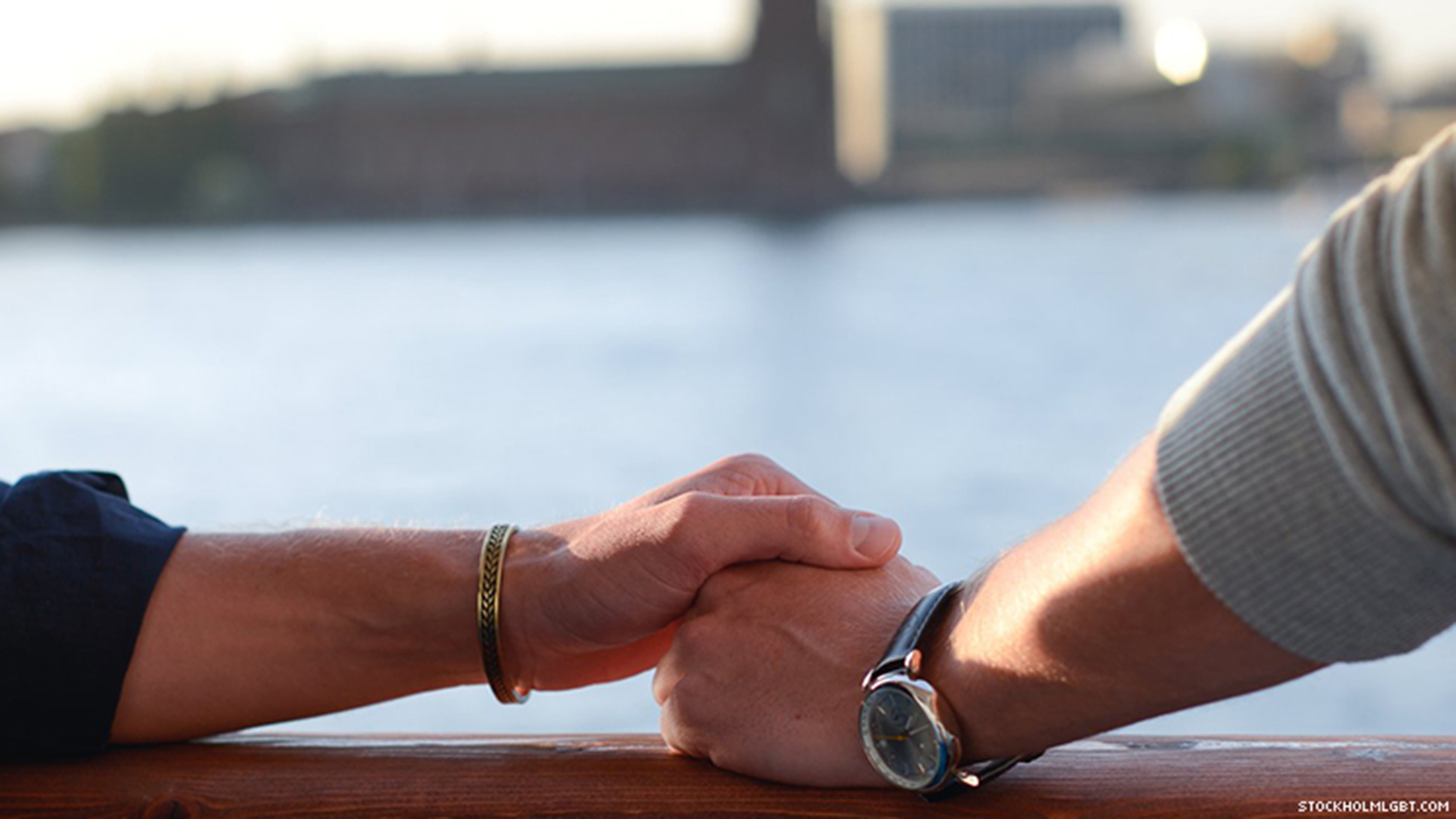 Gay couple holding hands in Stockholm, Sweden