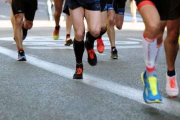 Marathon participants run through the city of Stockholm