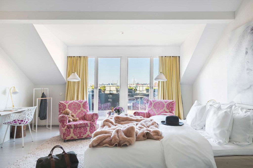 Bright attic suite with a private terrace at Hotel Rival, a Stockholm LGBT member hotel offering a relaxed, inclusive stay for all guests