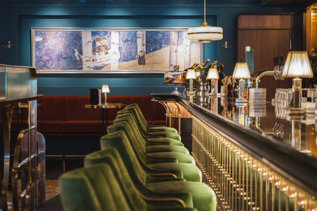 Art deco-inspired interior of Watson's Bar at Hotel Rival, the LGBTQ+ welcoming hotel's year-round bar in Stockholm, open to all guests every day of the week